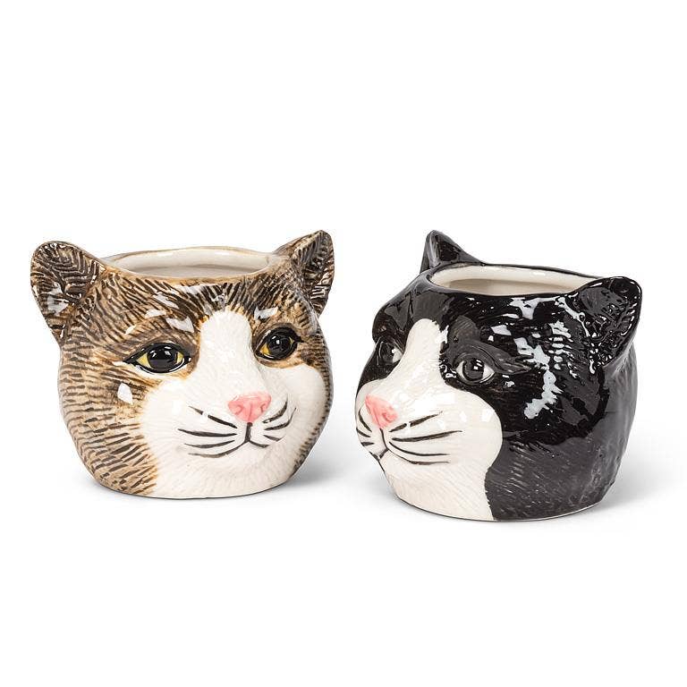 This adorable Small Tabby Cat Head Planter is the perfect complement to any cat lover's favorite cactus, succulent or flowers. Crafted out of ceramic, the cartoon-like shape of this cat head planter is sure to add a touch of fun and whimsy anywhere.