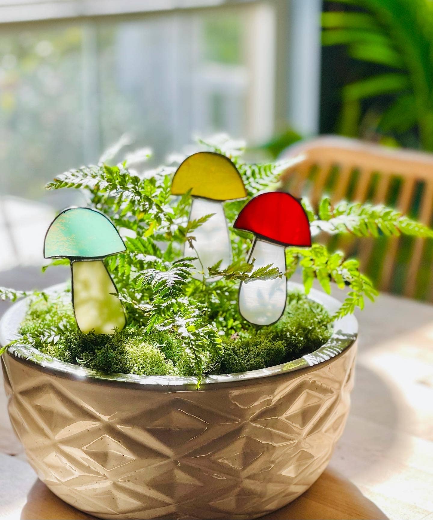 Handcrafted amber stained glass mushroom adds charm to plants or gardens. Weatherproof and pet-safe. Perfect for unique home decor and garden gifts.