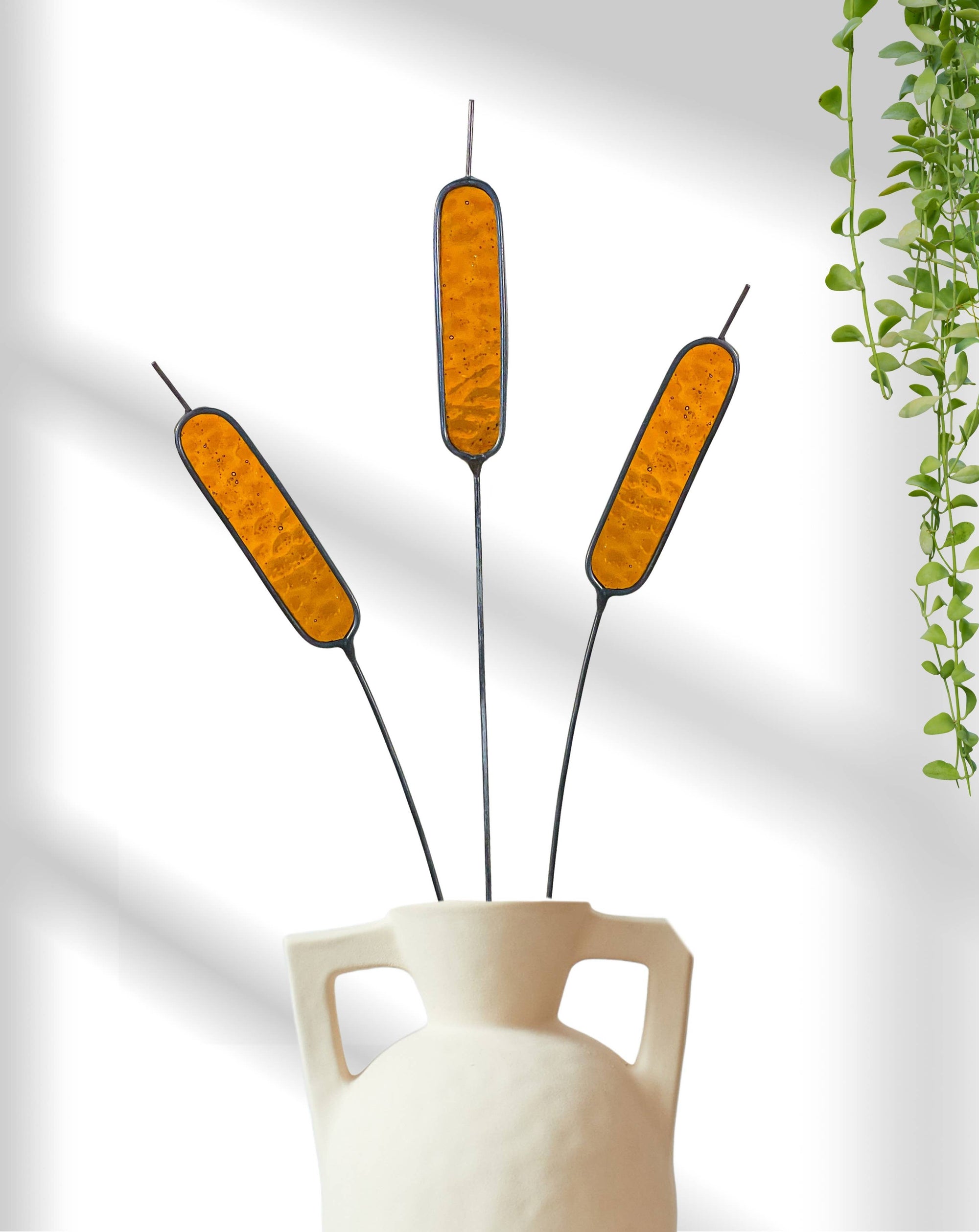 Handcrafted stained glass cattail stem for lasting, colorful home decor. Mix and match with other stems for a custom, everlasting floral arrangement.