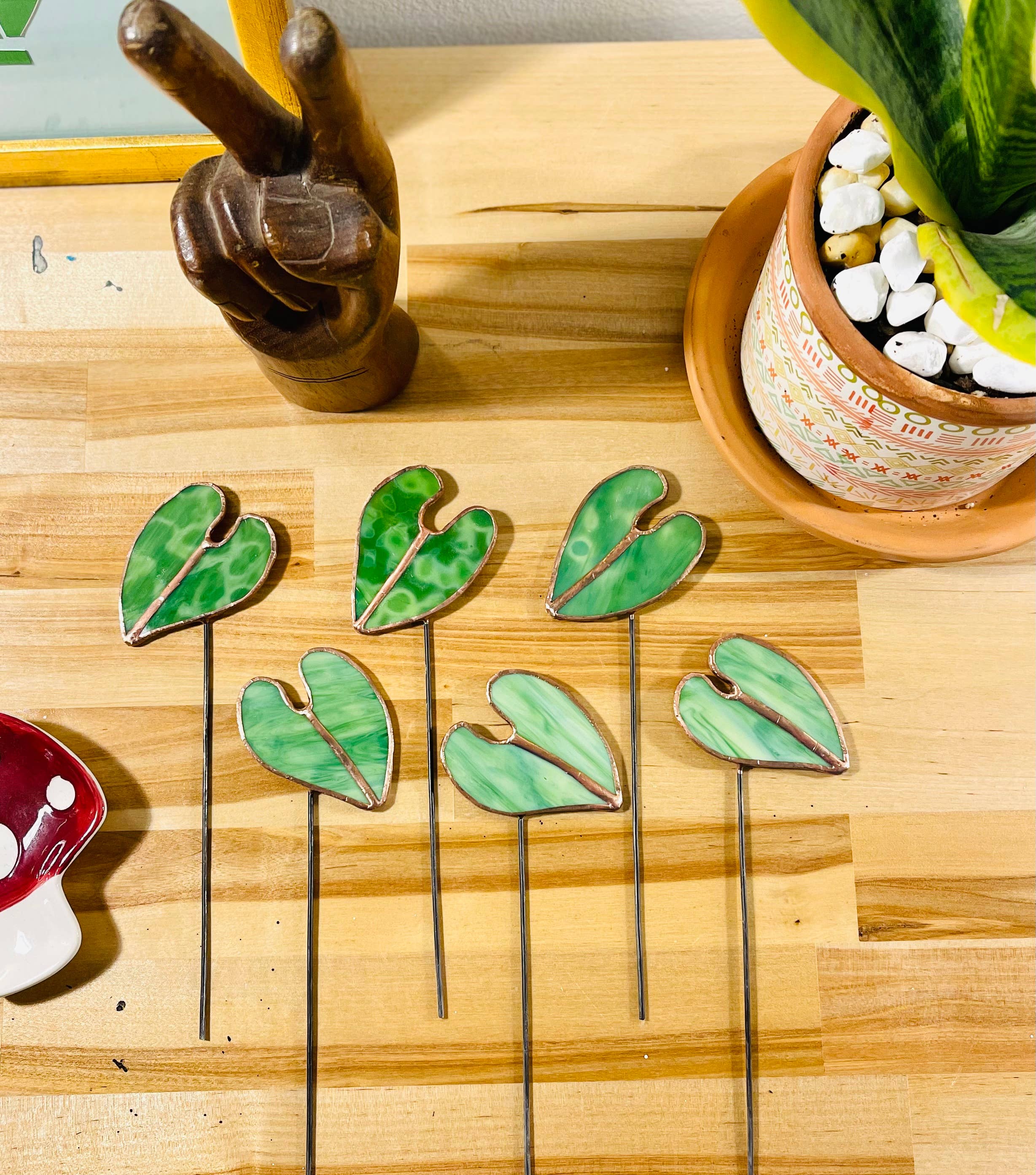 Bring a pop of color and artistry to your home with this handcrafted stained glass elephant ear by Samara Designs Studio. Each piece is made by hand using carefully selected stained glass, cut and assembled with care to create a lasting botanical accent that will never wilt or fade.