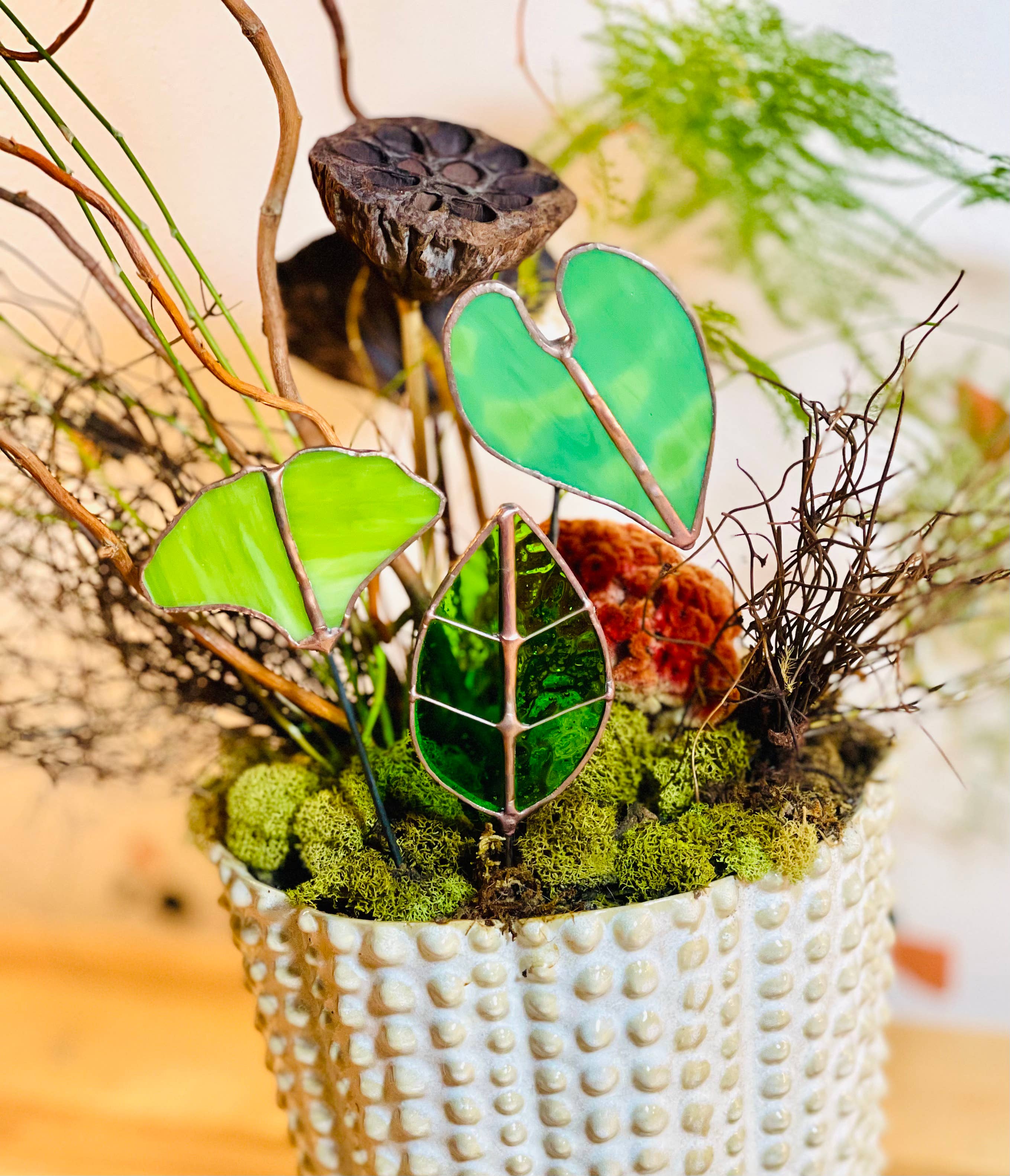 Bring a pop of color and artistry to your home with this handcrafted stained glass elephant ear by Samara Designs Studio. Each piece is made by hand using carefully selected stained glass, cut and assembled with care to create a lasting botanical accent that will never wilt or fade.