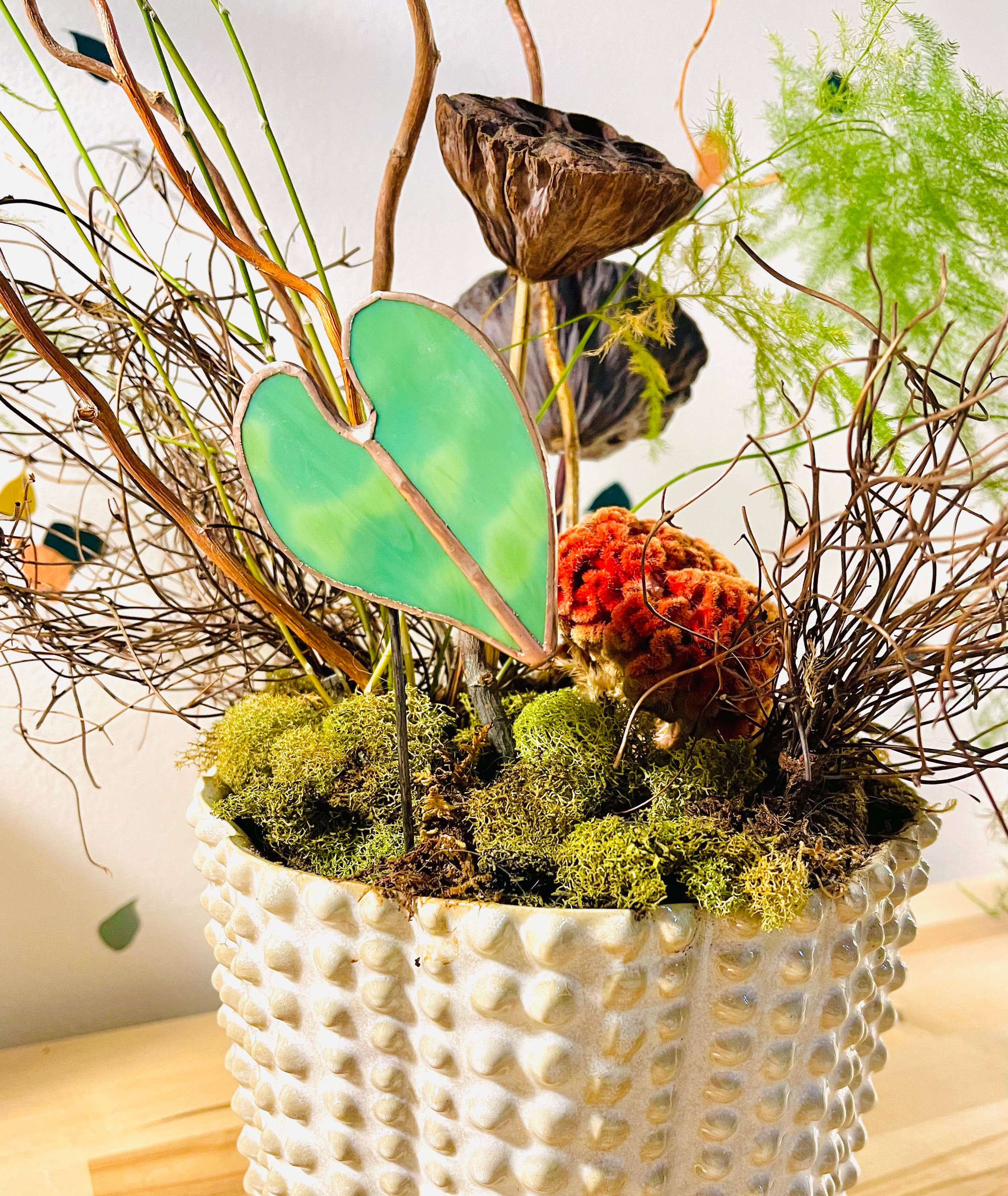 Bring a pop of color and artistry to your home with this handcrafted stained glass elephant ear by Samara Designs Studio. Each piece is made by hand using carefully selected stained glass, cut and assembled with care to create a lasting botanical accent that will never wilt or fade.