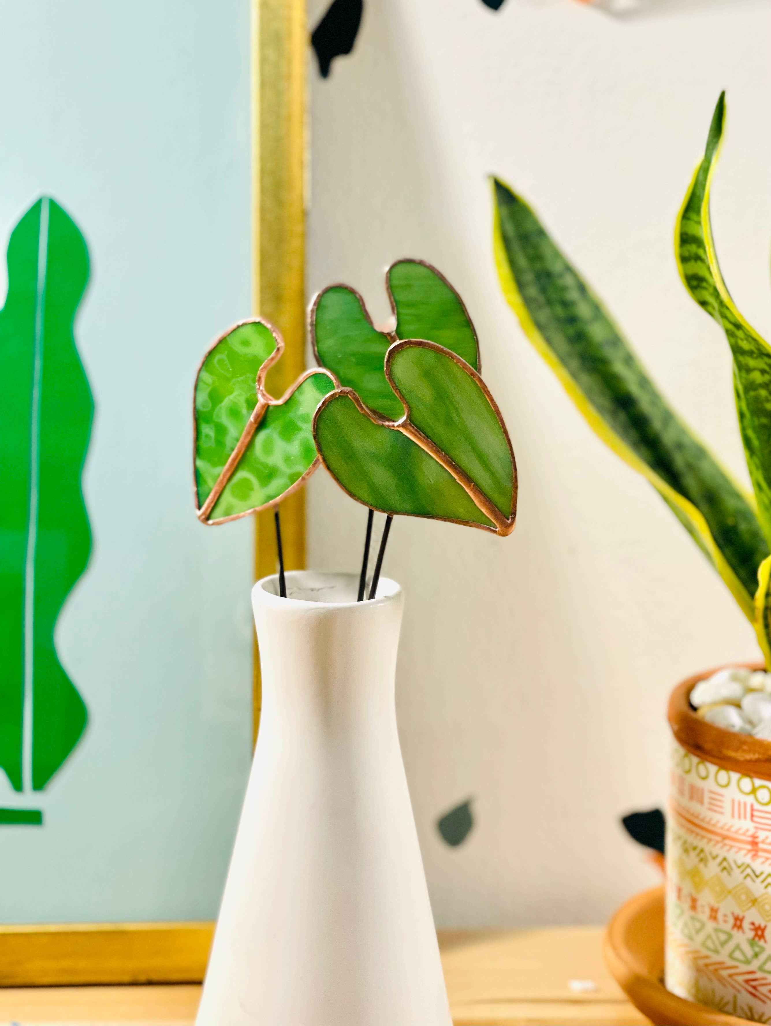 Bring a pop of color and artistry to your home with this handcrafted stained glass elephant ear by Samara Designs Studio. Each piece is made by hand using carefully selected stained glass, cut and assembled with care to create a lasting botanical accent that will never wilt or fade.