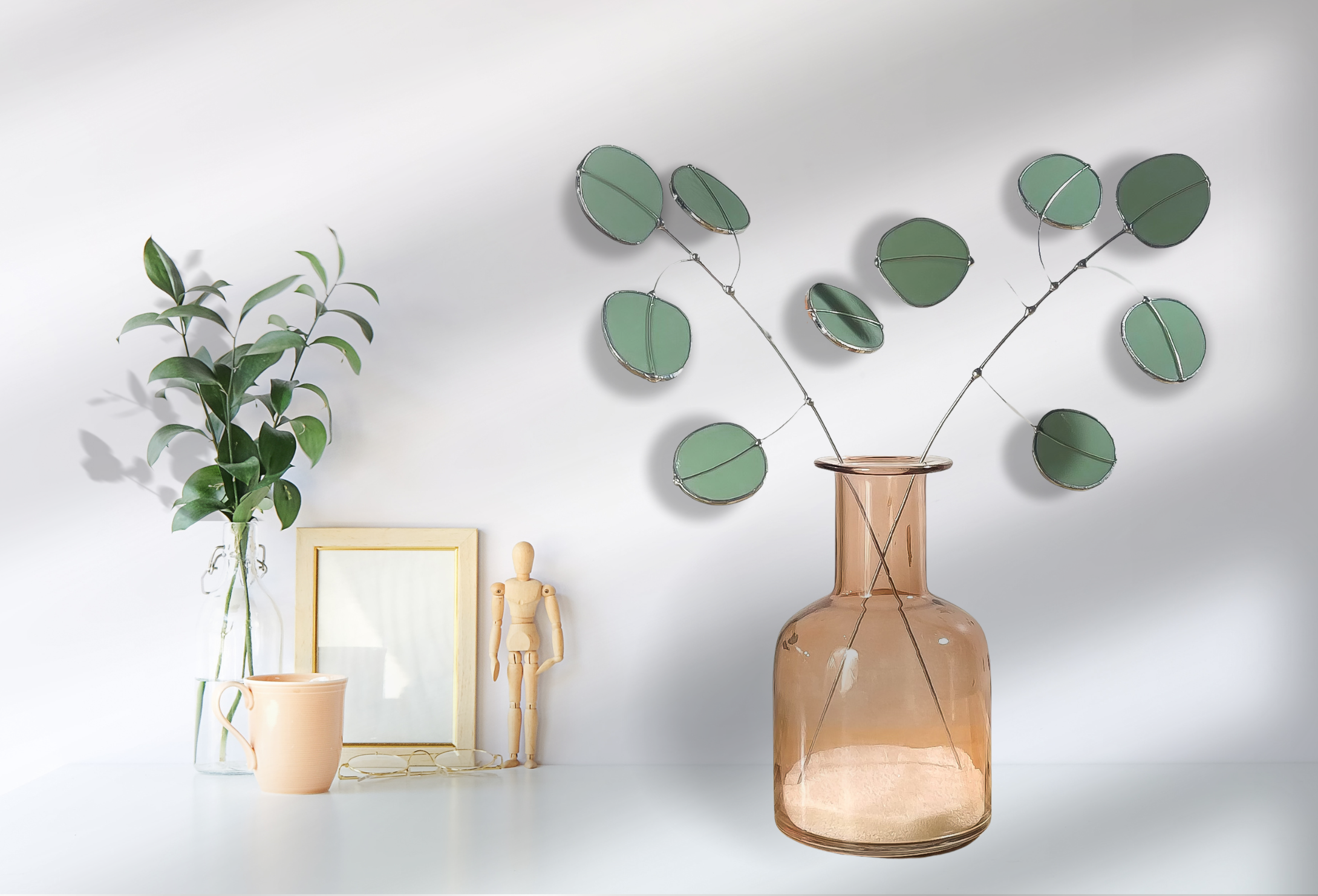 Bring a pop of color and artistry to your home with this handcrafted stained glass silver dollar eucalyptus stem by Samara Designs Studio. This stem is made from beautiful celadon green stained glass, carefully cut and assembled by hand to create a lasting botanical accent that will never wilt or fade.