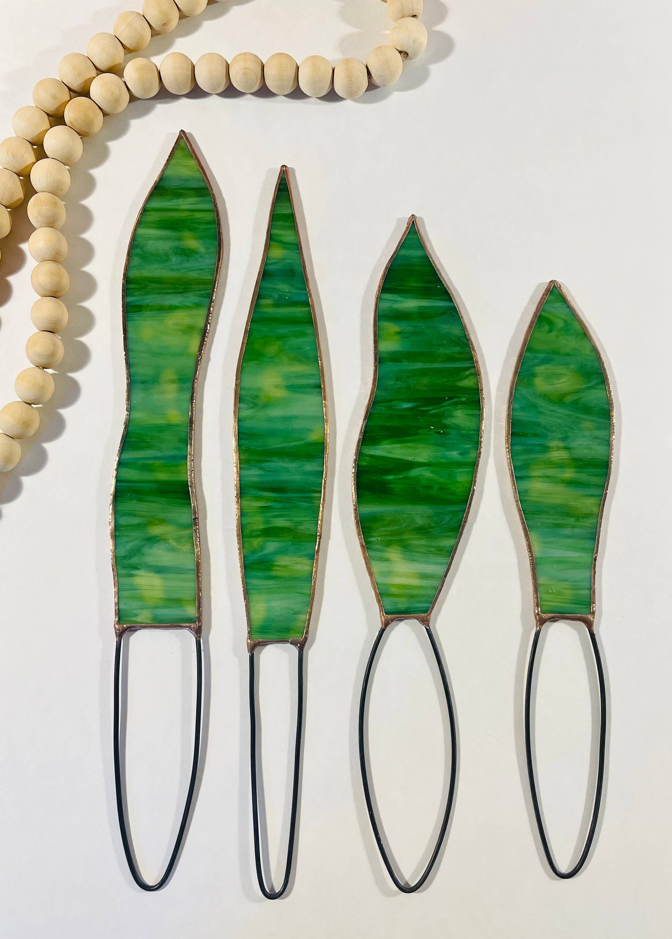 Handmade stained glass snake plant with 4 sculpted leaves. A cat-friendly, zero-maintenance houseplant alternative. Perfect for colorful home decor.