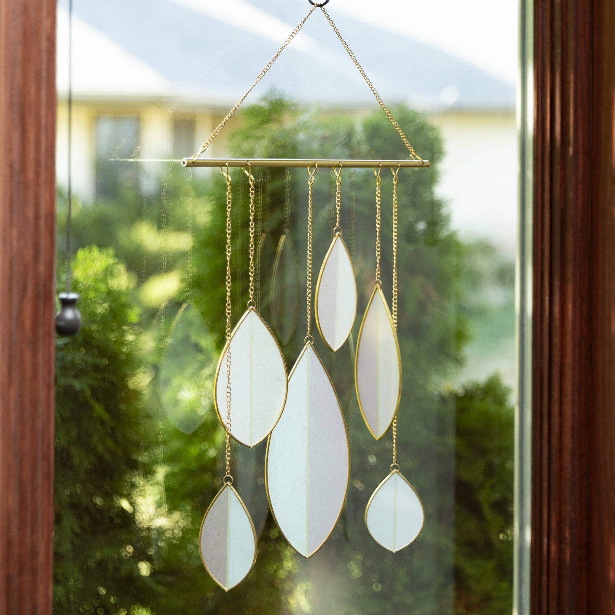 Brighten any room with this pink & green stained glass suncatcher with copper accents—elegant, modern, and perfect as a gift.