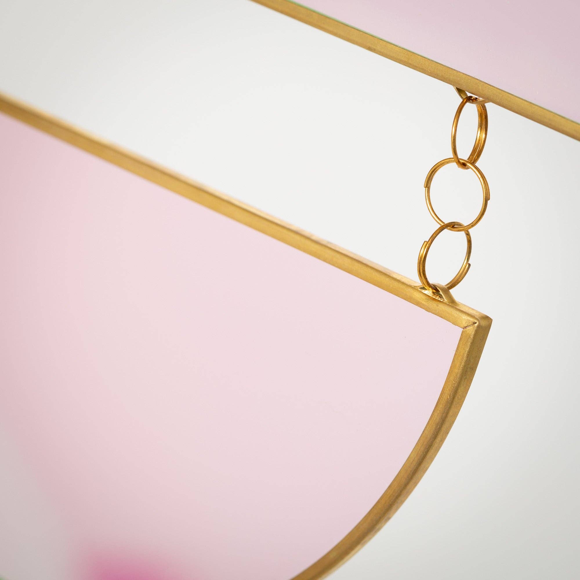 Catch sunlight in a brilliant prismatic display with this rainbow suncatcher—stained glass, gold accents, and vibrant, ever-changing colors.