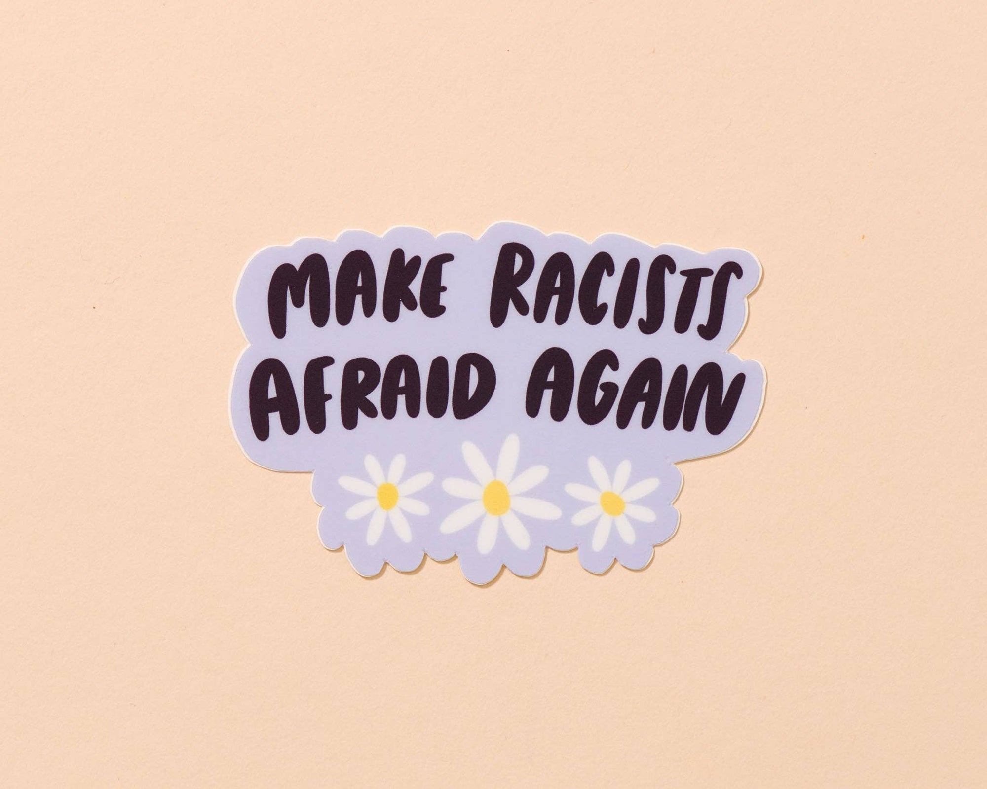 Need we say more? This sticker for speaking truth to power reads, "Make racists afraid again." Featuring original artwork by Kiwi Schloffel, this durable, waterproof sticker is perfect for laptops, water bottles, notebooks, or anywhere you want to make a statement.