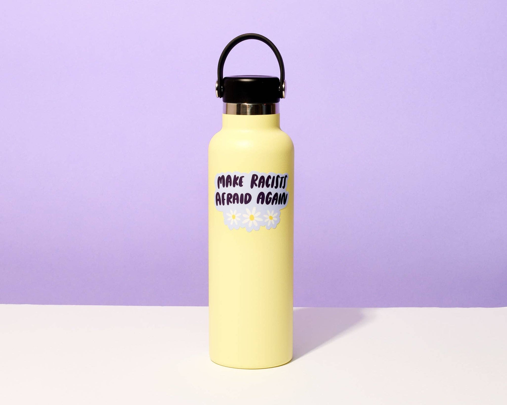 Need we say more? This sticker for speaking truth to power reads, "Make racists afraid again." Featuring original artwork by Kiwi Schloffel, this durable, waterproof sticker is perfect for laptops, water bottles, notebooks, or anywhere you want to make a statement.