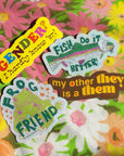 Four colorful stickers with text and graphics on a floral background