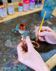 Hand-painted in bold accent colors on genuine leather and is the optimal size for carrying your keys in style. This key fob has a solid rivet and key ring of your choice, and features up to three hand-tooled initials! Hand-painted in bold accent colors on natural veg-tanned leather, this key fob has a solid brass rivet and split ring, and is the optimal size for carrying your keys in style. Available in your choice of any of our custom colors.