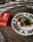 Tender squid in rich squid ink sauce, hand-packed in Spain. Perfect for paella, risotto, or toast. Bold, briny flavor in every bite. Conservas at its best.