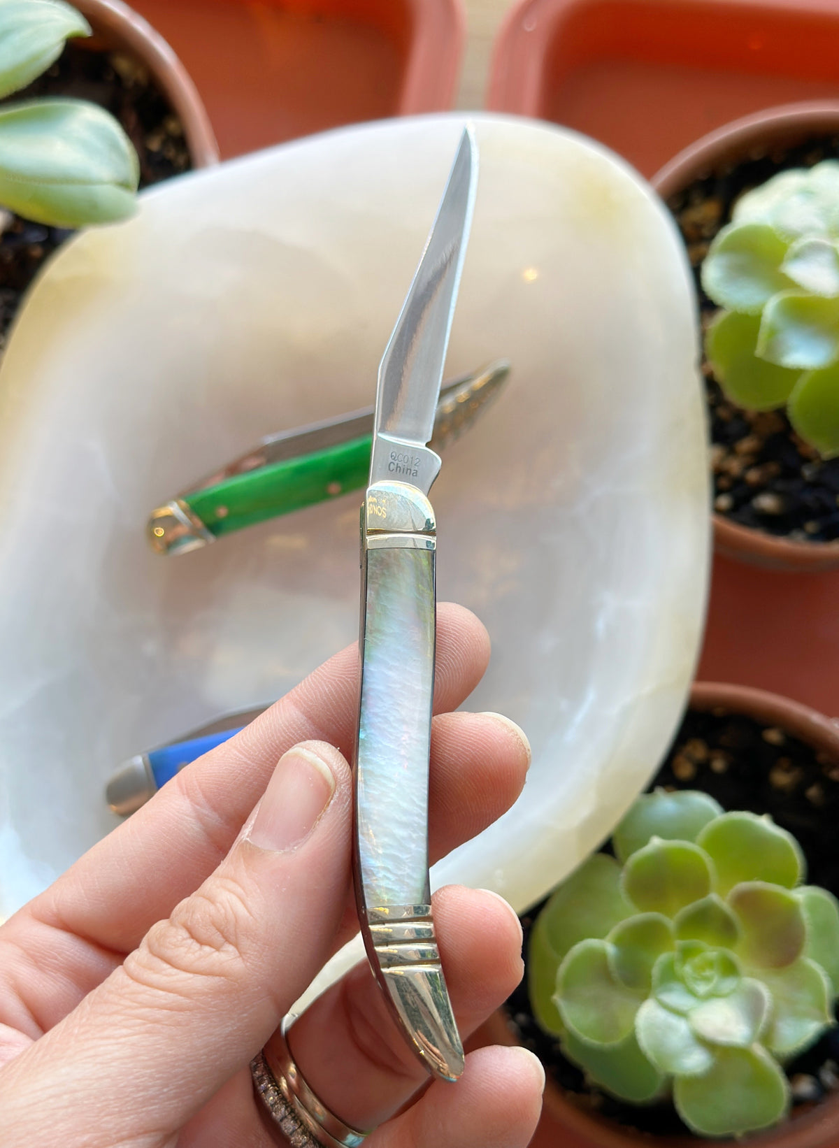 Elevate your urban carry with the Toothpick Knife—featuring a sleek black pearl handle, mirror-finish stainless blade, and nickel silver details for timeless style.