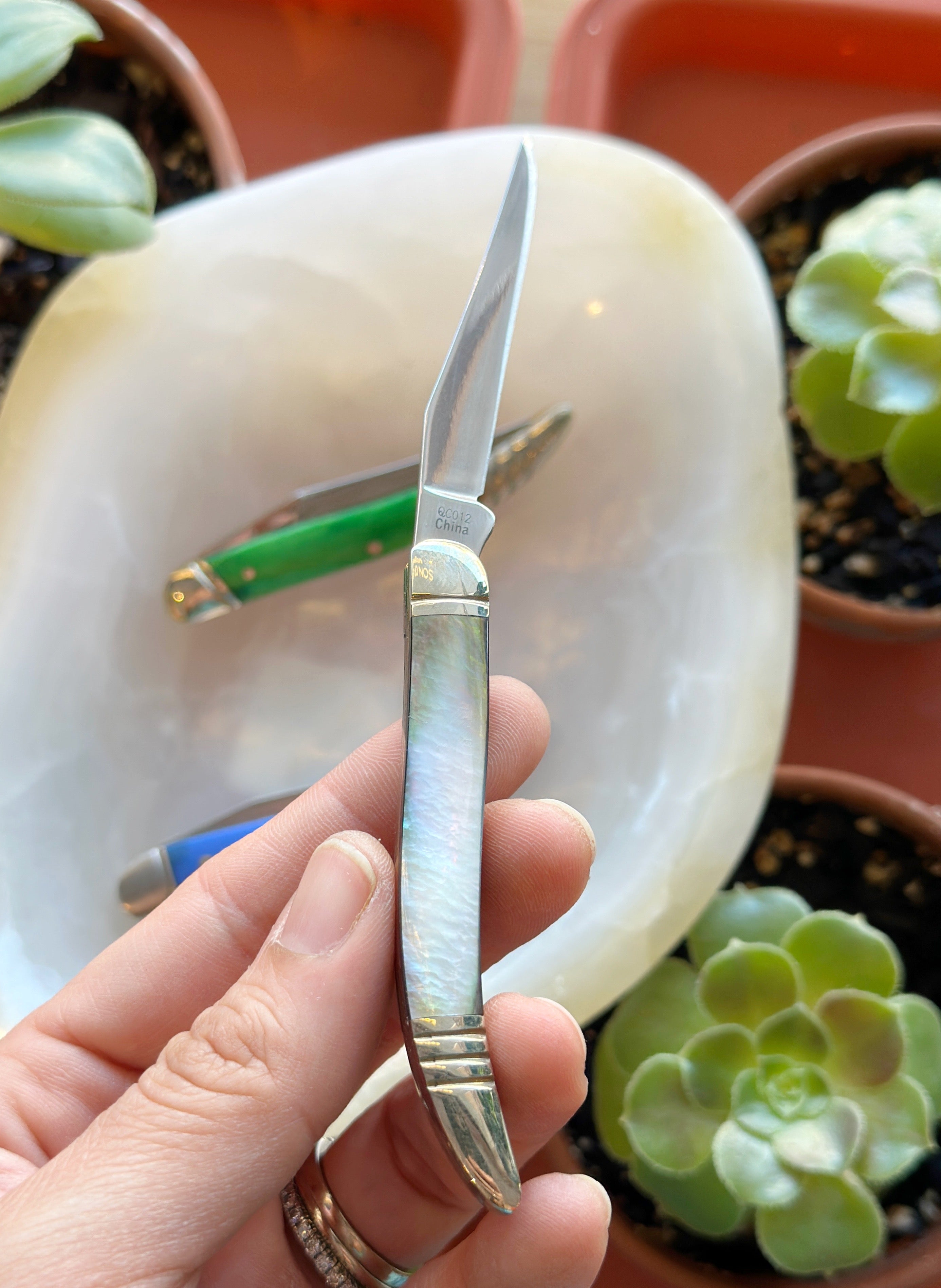 Elevate your urban carry with the Toothpick Knife—featuring a sleek black pearl handle, mirror-finish stainless blade, and nickel silver details for timeless style.