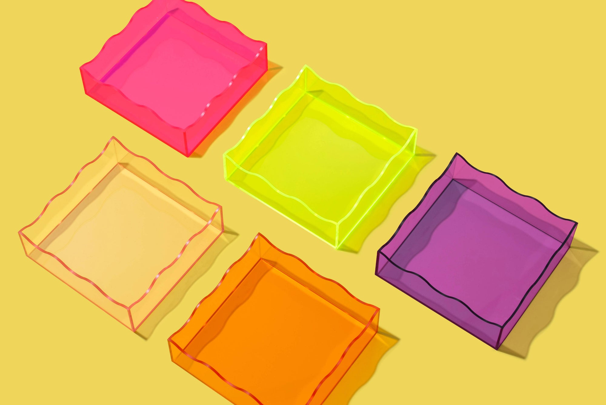 Bring a bold pop of color to your space with this neon green acrylic tray! Whether you're organizing your desk or styling your vanity, this vibrant tray adds a modern, playful touch. Made from durable acrylic, it’s perfect for both everyday use and eye-catching decor.