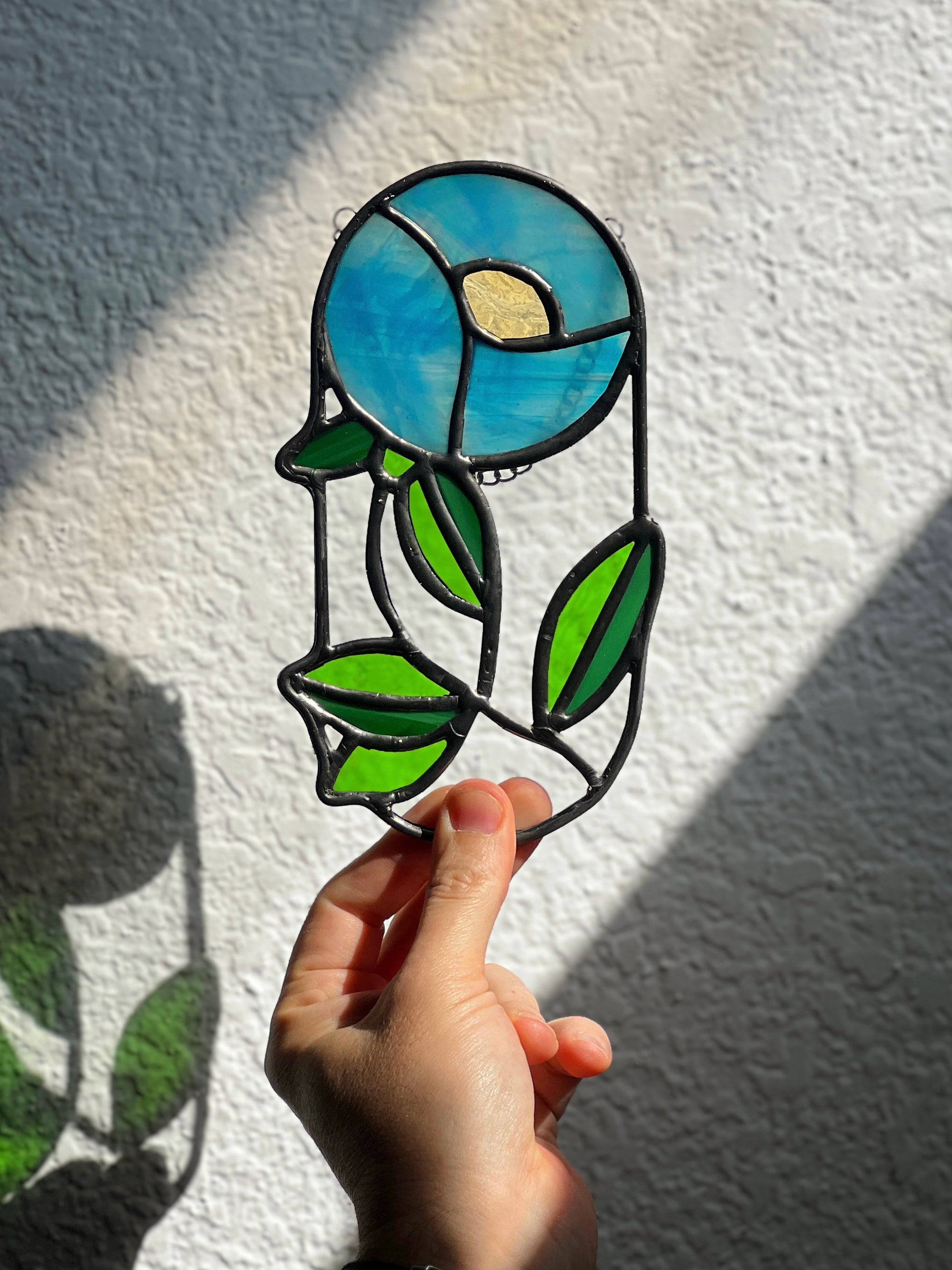 Handcrafted stained glass flower suncatcher. Tulip, blue bud, iris & poppy designs. Floral window decor & nature lover gift for sunny windows.