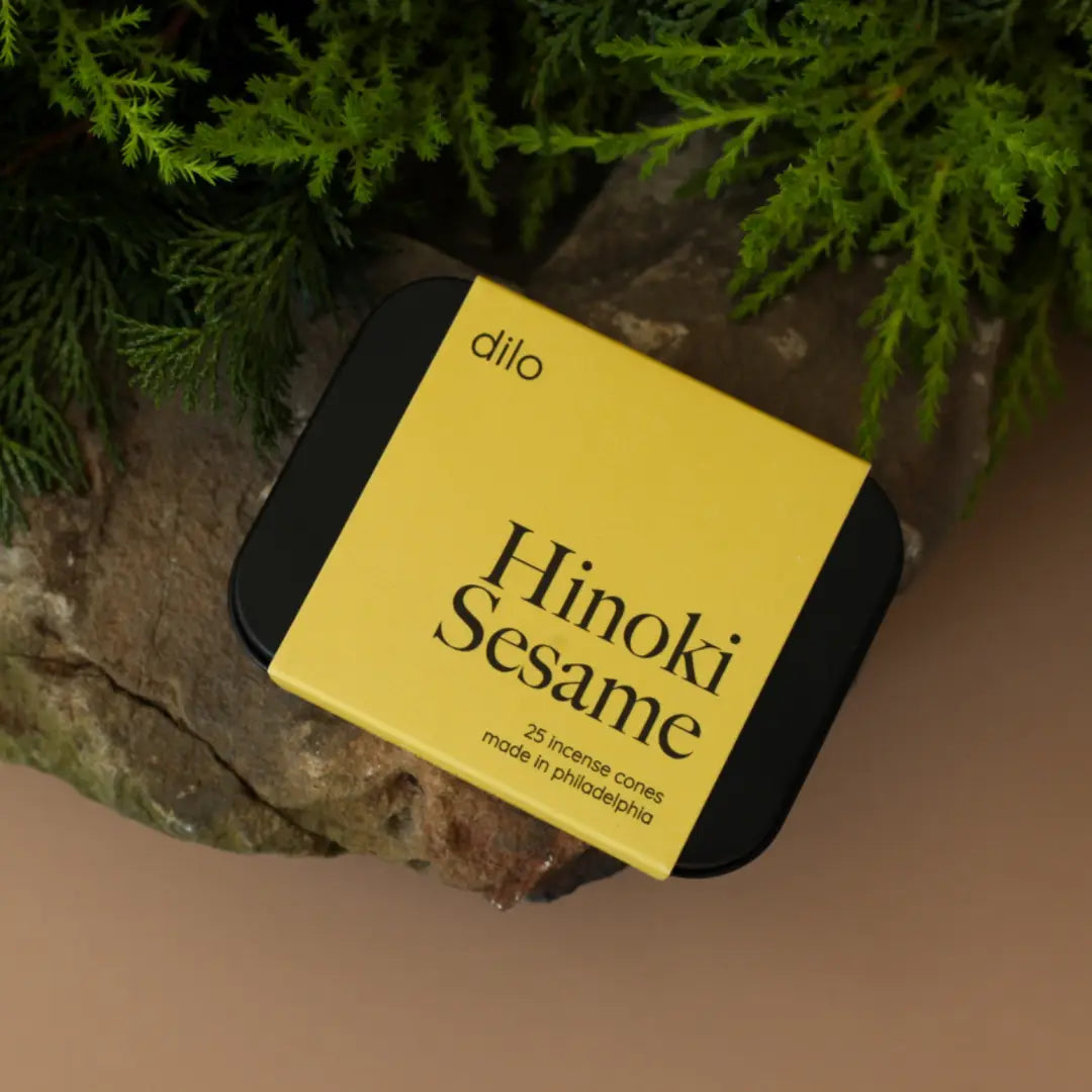 Light a cone to fill your space with coastal sea salt, smoky incense & hinoki wood. 25 cones per tin. A rich, layered scent for any space.