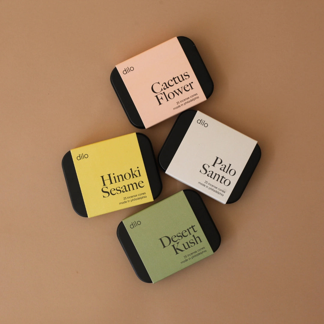 Light a cone to fill your space with coastal sea salt, smoky incense & hinoki wood. 25 cones per tin. A rich, layered scent for any space.