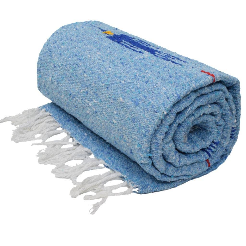 Light blue thunderbird blanket rolled up with white fringe, on a white background