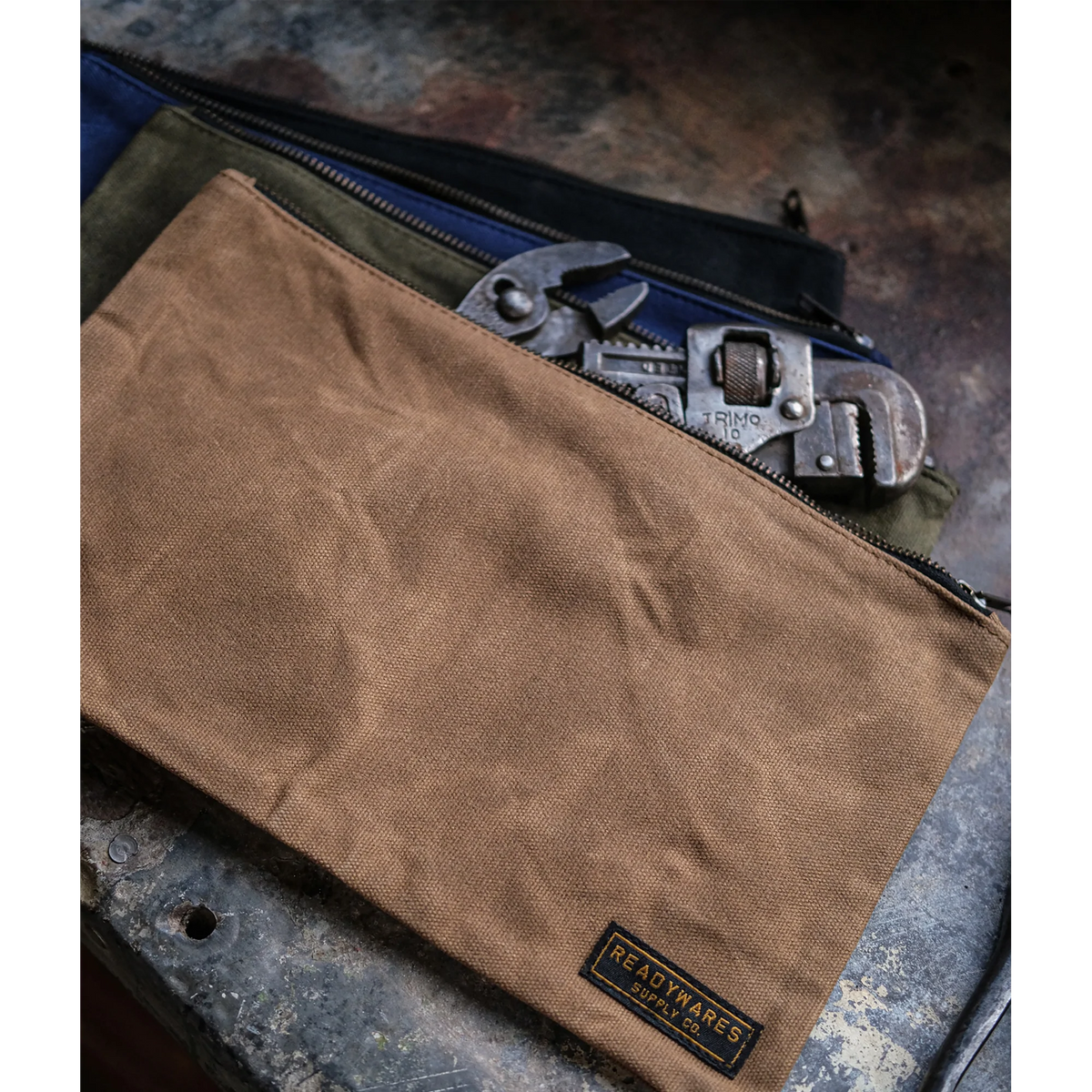 Waxed canvas zipper tool bags in tan, olive, navy and black