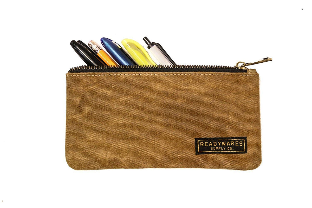 Waxed canvas zip pouches in tan, olive, navy and black