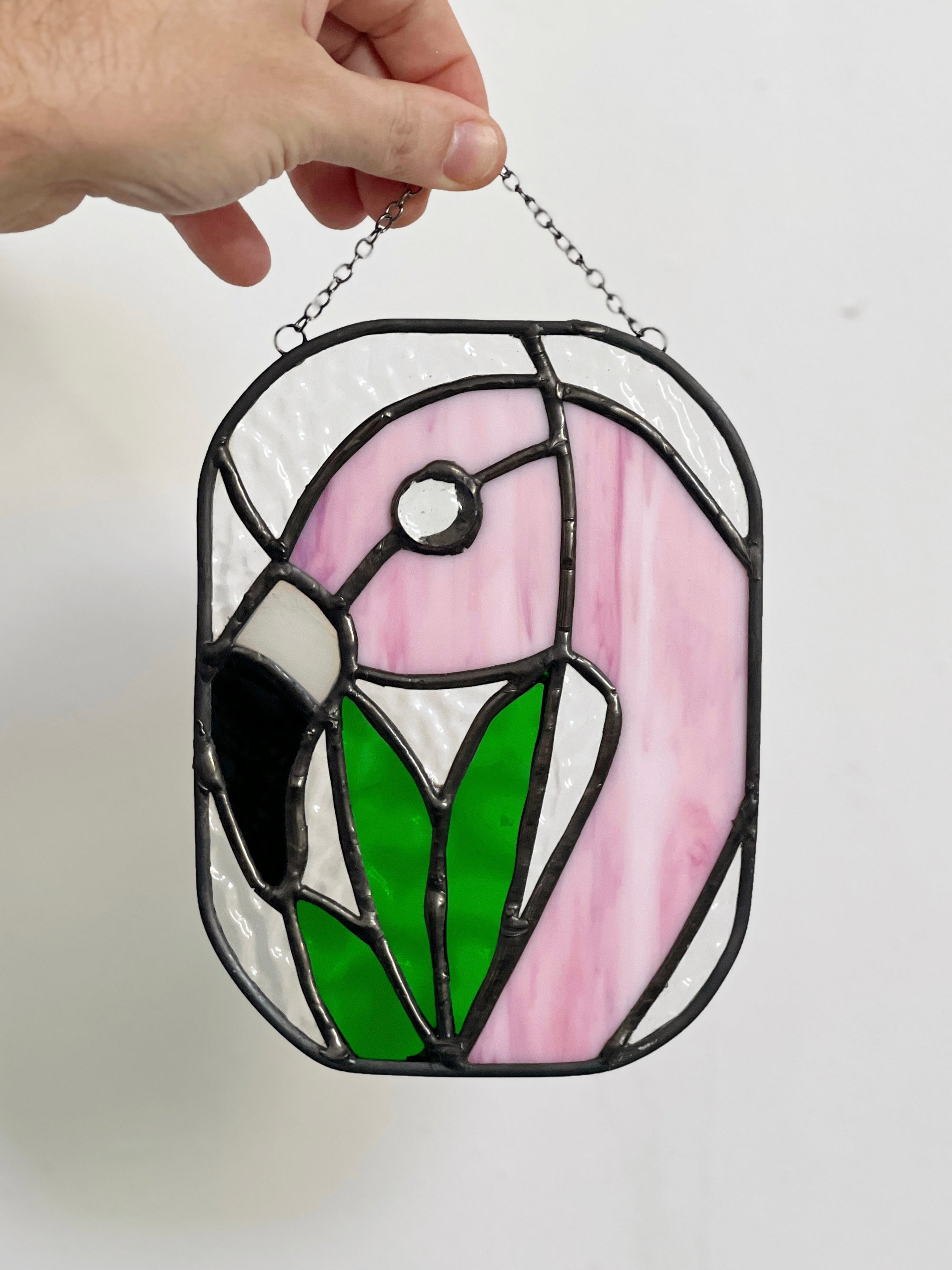 Handcrafted stained glass bird suncatcher. Flamingo, hummingbird & owl designs. Unique window decor & bird lover gift. Perfect for sunny windows.