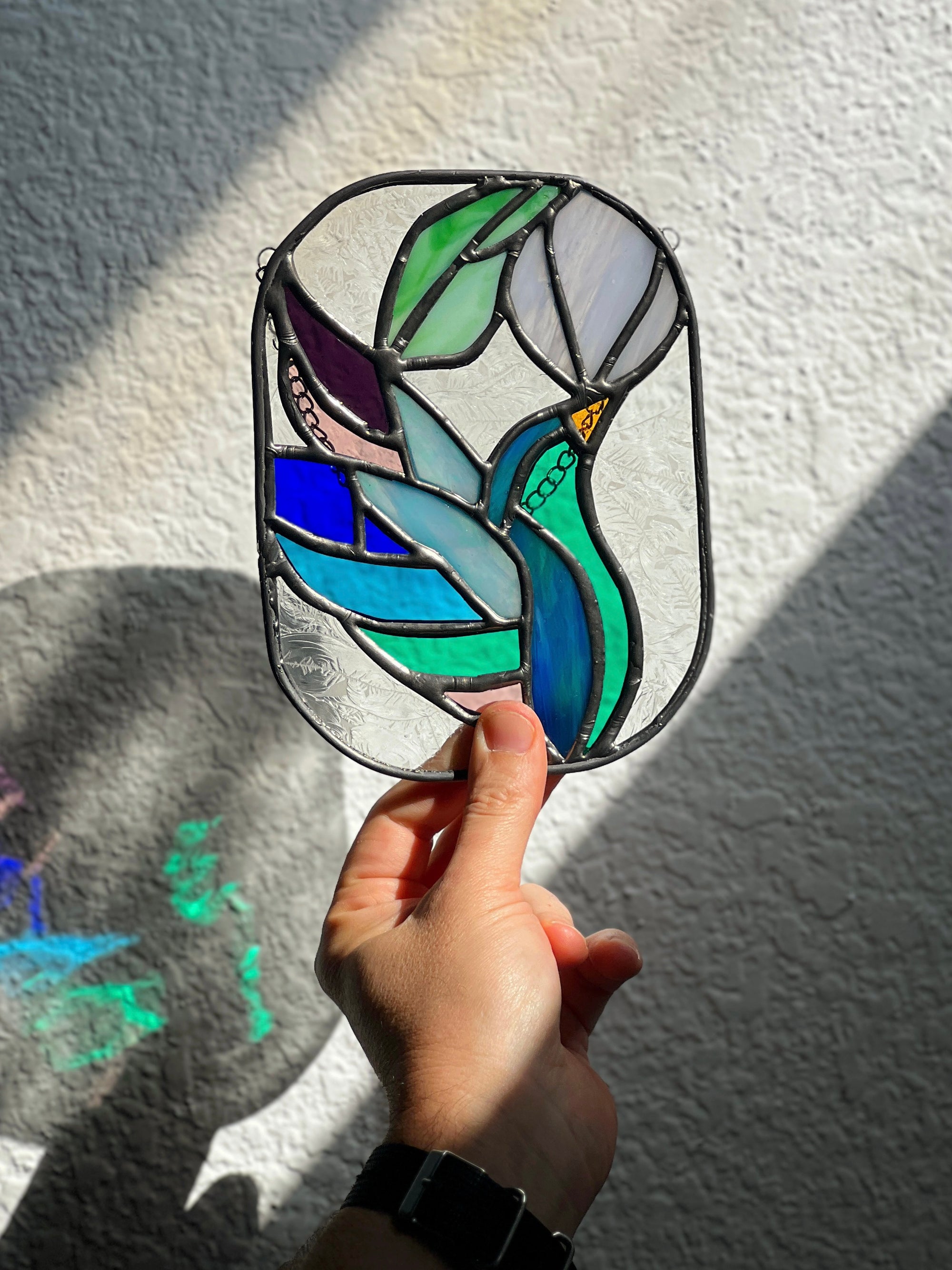 Handcrafted stained glass bird suncatcher. Flamingo, hummingbird & owl designs. Unique window decor & bird lover gift. Perfect for sunny windows.