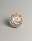 Silver-toned coin with LOVE on a banner, standing on a light gray background