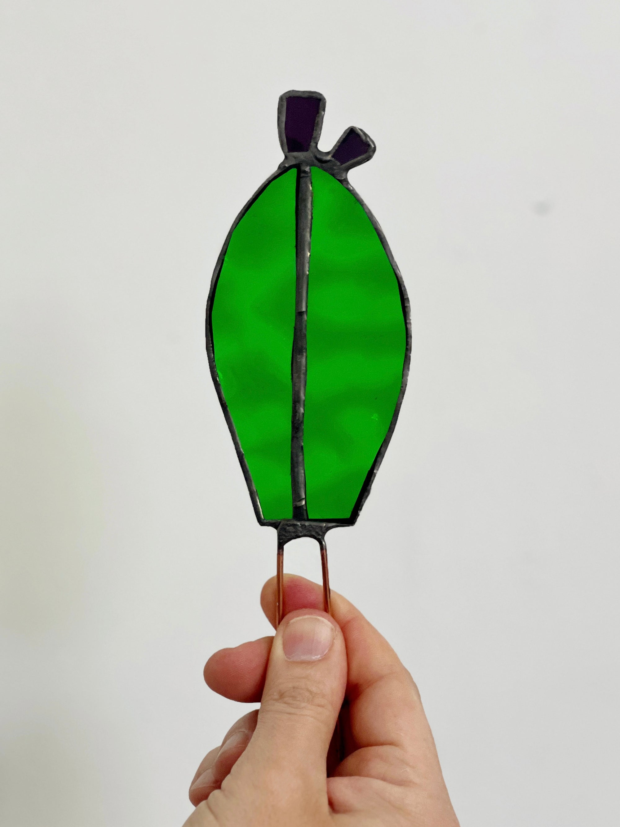 Handcrafted stained glass nopales prickly pear cactus plant stake. Unique boho garden decor & plant lover gift for pots & indoor planters.