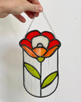 Handcrafted stained glass flower suncatcher. Tulip, blue bud, iris & poppy designs. Floral window decor & nature lover gift for sunny windows.