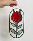Handcrafted stained glass flower suncatcher. Tulip, blue bud, iris & poppy designs. Floral window decor & nature lover gift for sunny windows.