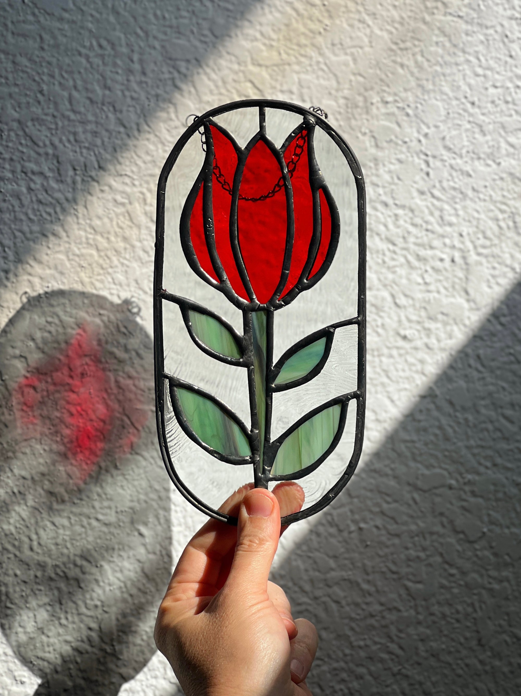 Handcrafted stained glass flower suncatcher. Tulip, blue bud, iris & poppy designs. Floral window decor & nature lover gift for sunny windows.