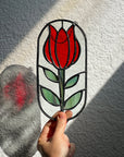 Handcrafted stained glass flower suncatcher. Tulip, blue bud, iris & poppy designs. Floral window decor & nature lover gift for sunny windows.
