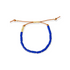 Periwinkle Ada bracelet of ceramic tube beads on a leather cord on white