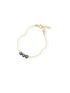 Perla bracelet with three black freshwater pearls on a 14k gold-filled chain, on white