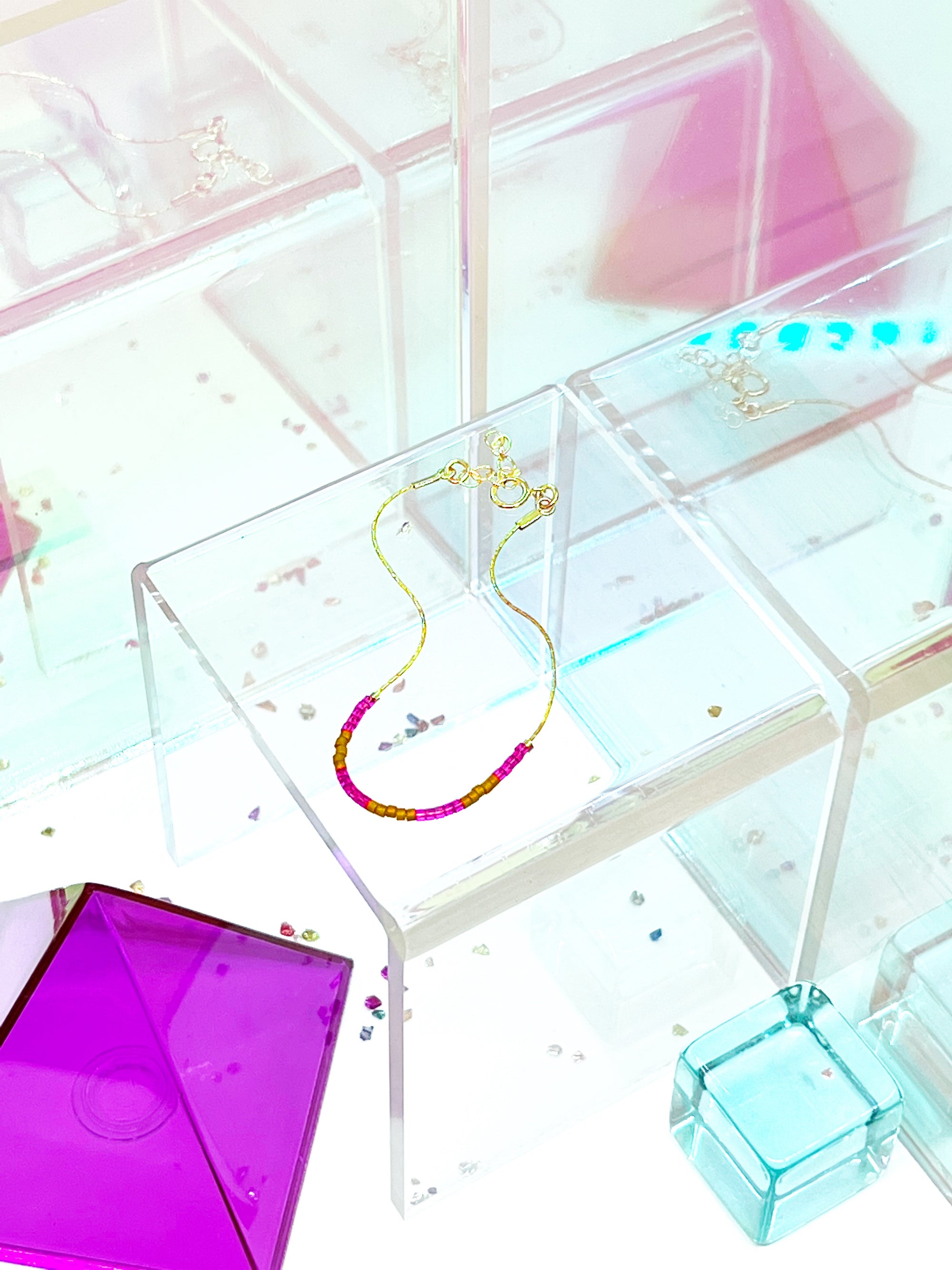 Step into a world of vibrant energy with our Kaleid Bracelet, featuring periwinkle and cream colors inspired by the beautiful Santorini coast.&nbsp;Refined Japanese glass beads are meticulously threaded onto your choice of 14k gold-filled or sterling silver chain — a match made in jewelry heaven. Both options promise a shine that withstands the test of time, ensuring your Kaleid Bracelet remains a centerpiece in your collection for decades to come.